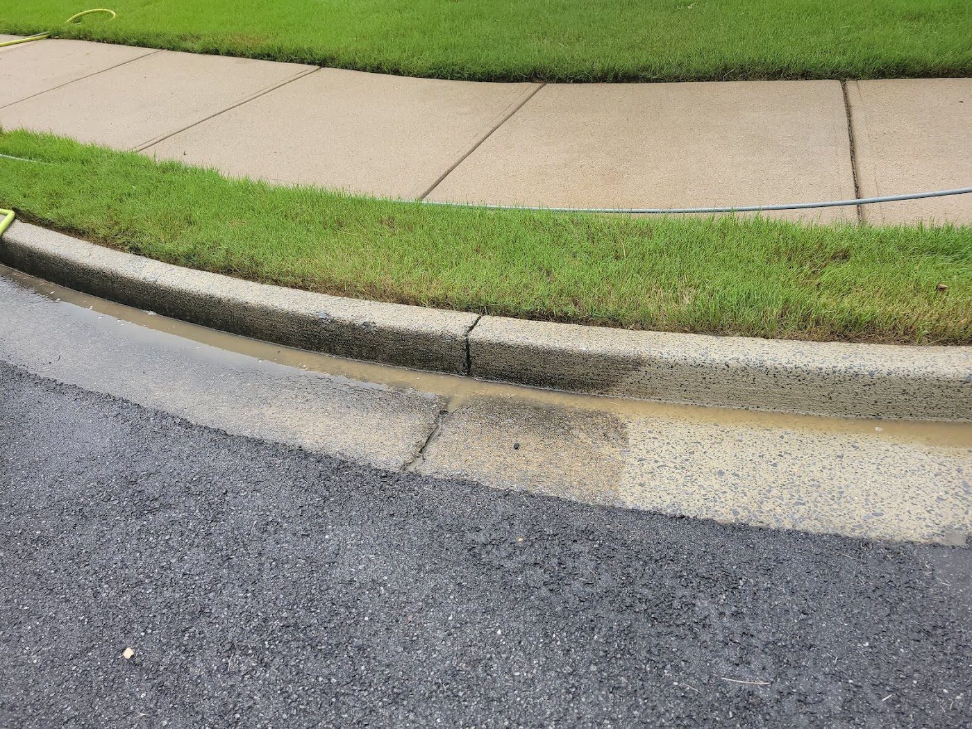 Curb and sidewalk cleaning